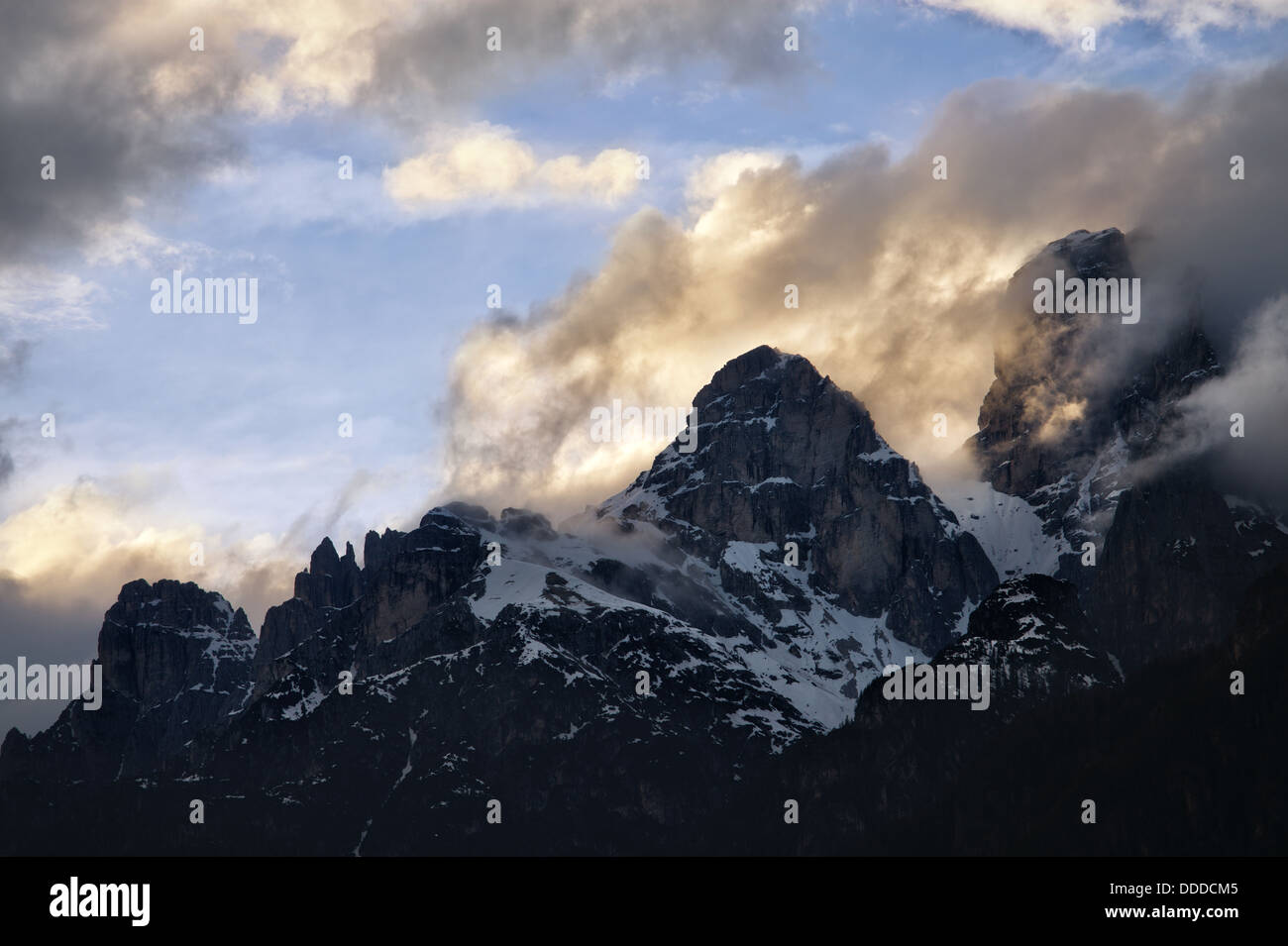 Cloudy sunset over Dolomites mountains. Italian Dolomites Stock Photo ...