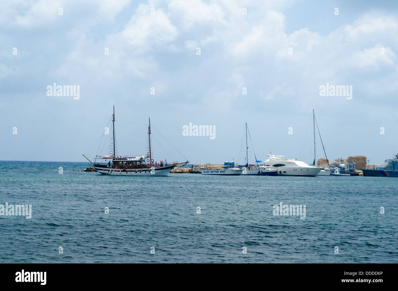 White motor yacht over harbor pier Stock Photo - Alamy