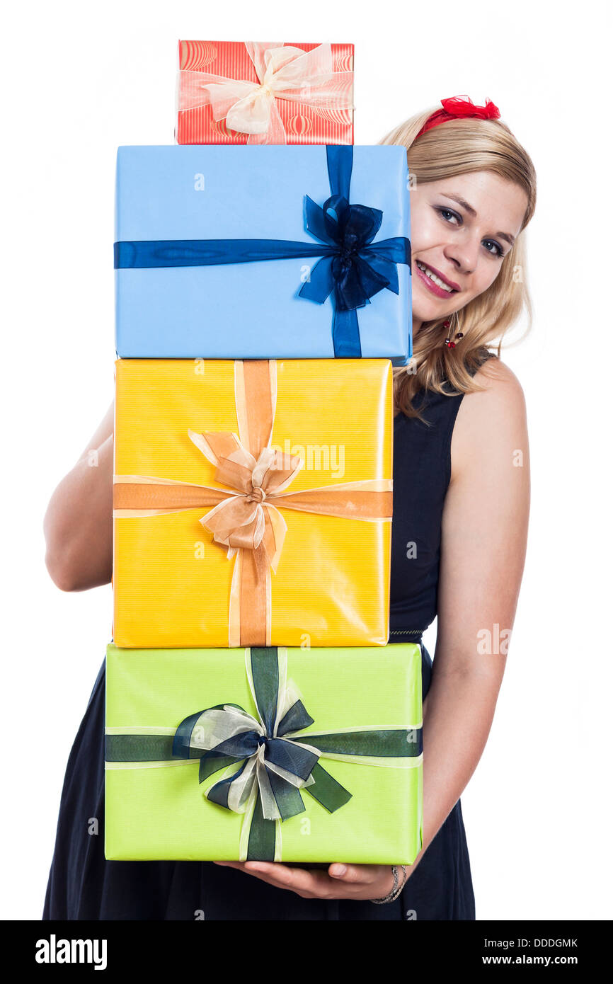 Happy woman holding many colorful presents, isolated on white background. Stock Photo