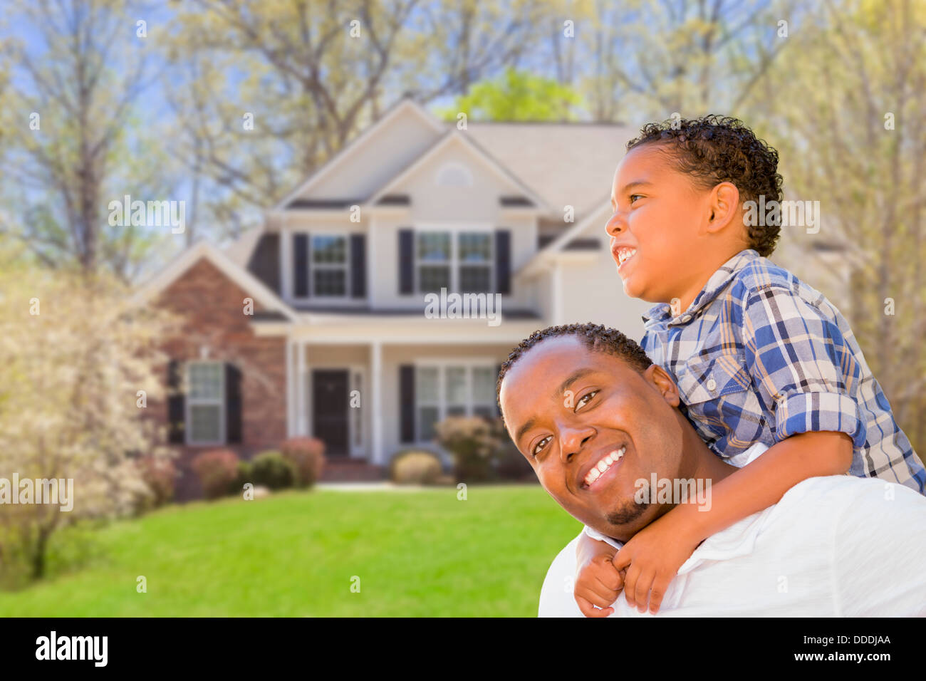 Happy Playful African American Father and Mixed Race Son In Front of ...