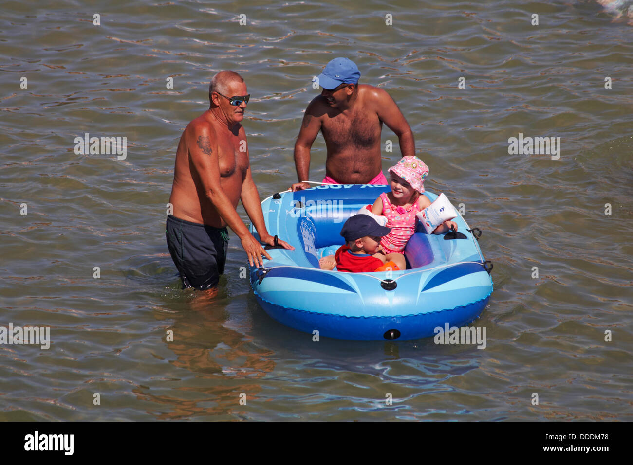 Rubber dinghy kids hires stock photography and images Alamy