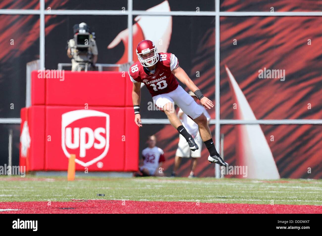 Aug 31, 2013: Arkansas kicker Zach Hocker #18 leaps into the air ...