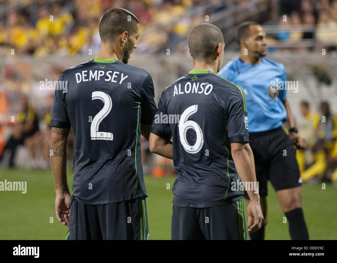 Aug. 31, 2013 - Columbus, Ohio, United States of America - August 31, 2013: Seattle Sounders FC forward Clint Dempsey (2) and teammate Seattle Sounders FC midfielder Osvaldo Alonso (6) during the Major League Soccer match between the Seattle Sounders FC and the Columbus Crew at Columbus Crew Stadium in Columbus, OH. The Seattle Sounders FC defeated the Columbus Crew 1-0. Stock Photo