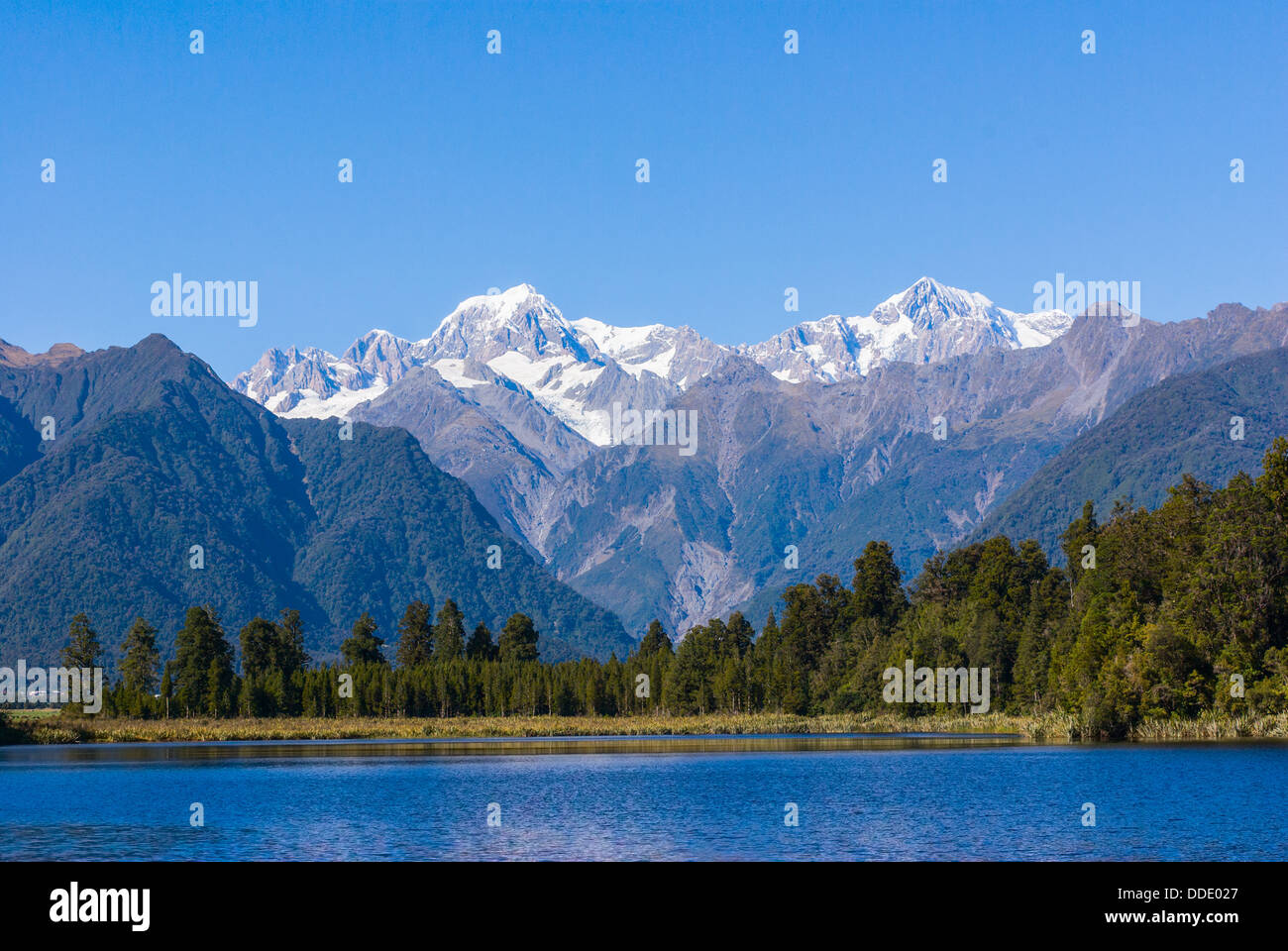 Aoraki Mount Cook (3754m) is the highest mountain in New Zealand and is seen here from Lake Matheson Stock Photo