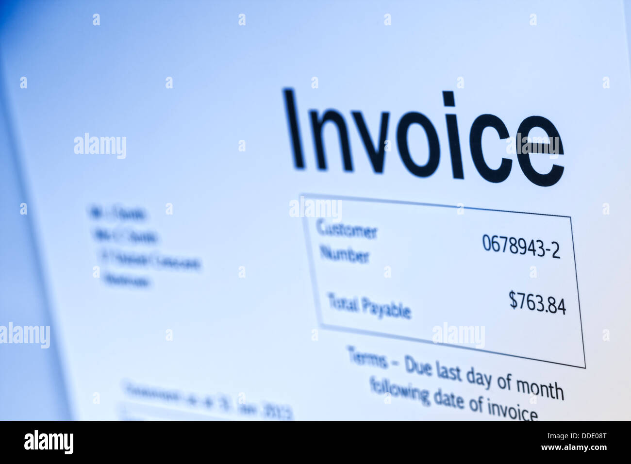 Invoice, shallow DOF, blue toned. All details are imaginary. Stock Photo