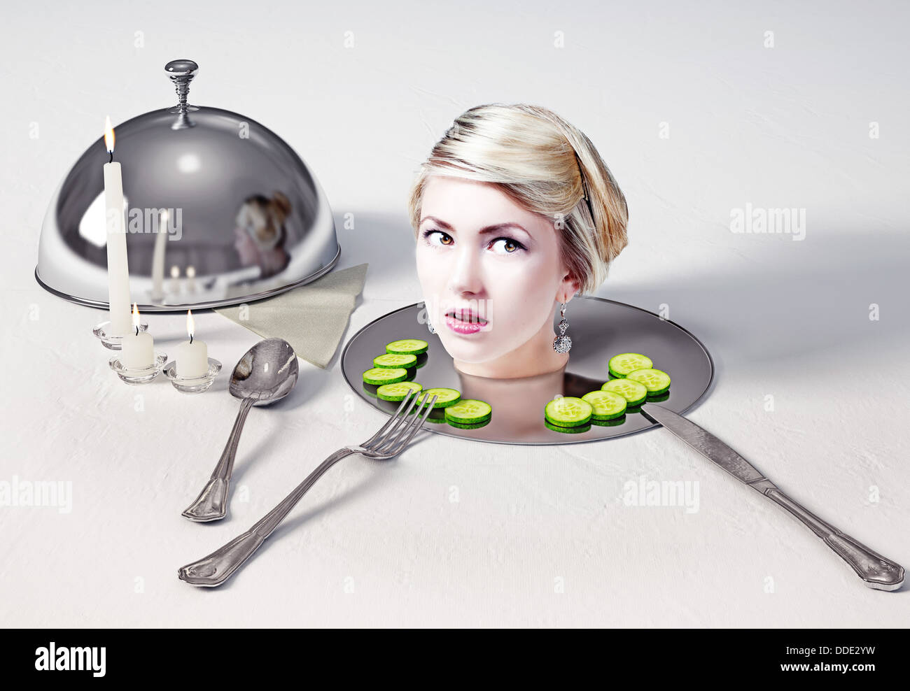 Portrait Of The Head Of A Beautiful Woman Standing On A Dish On Table 