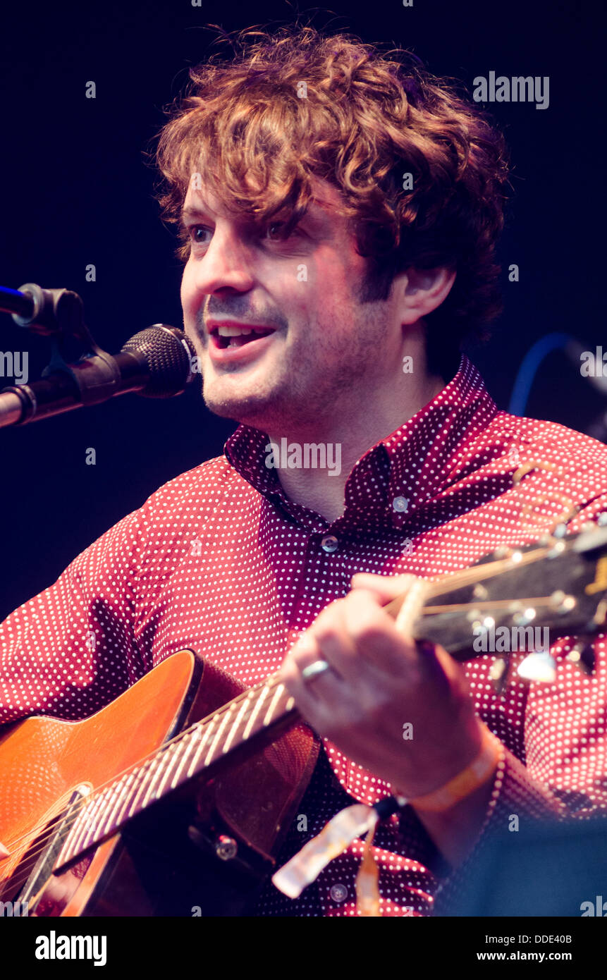 31st August 2013 - Bingley, Yorkshire. Chris Helme of The Seahorses  performs on stage on day 2 of Bingley Music Live. Other acts appearing on  the bill include The Human League, Chic,