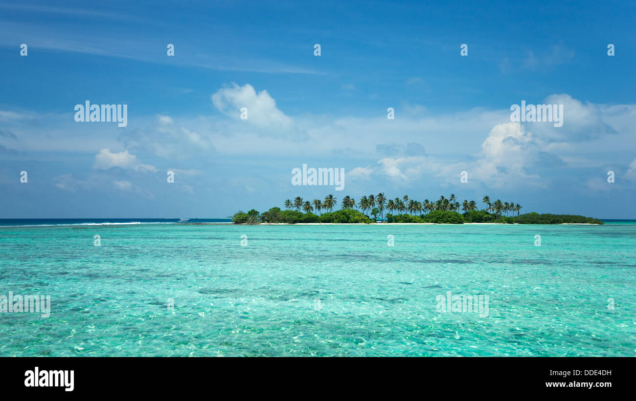 Tropical island in the ocean Stock Photo - Alamy