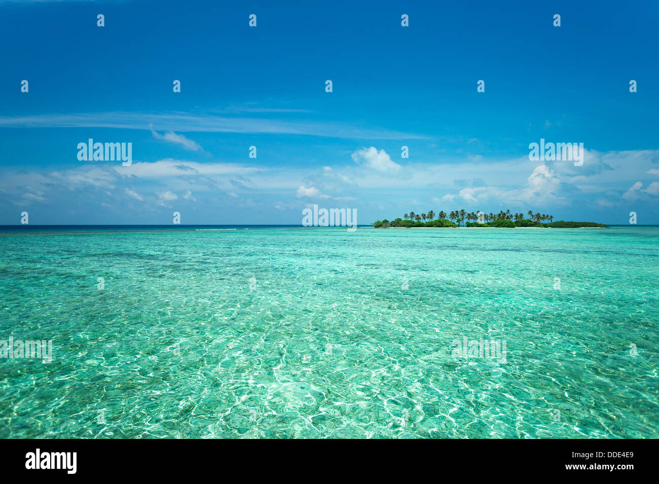 Tropical island in the ocean Stock Photo - Alamy