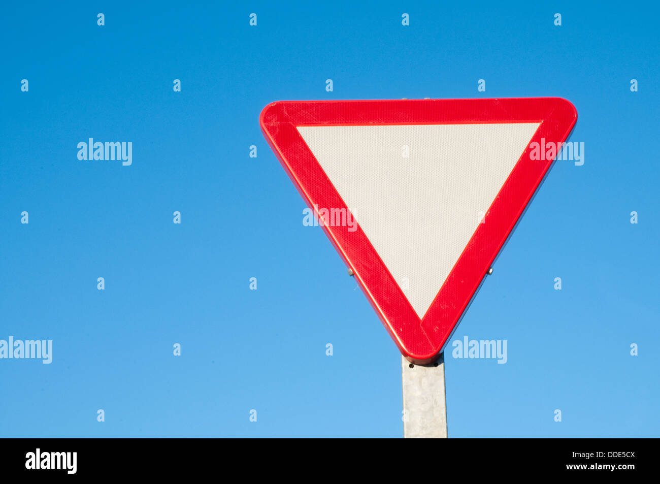 Keep way traffic sign against blue sky. Stock Photo