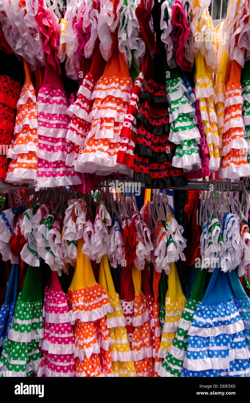 Flamenco dresses on sale in tourist shop in Nerja, andalusia, Spain. Stock Photo