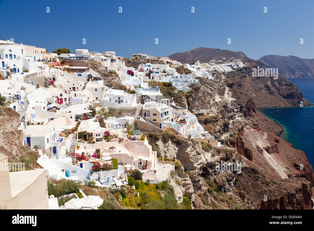 Colorful Oia along the crater rim of Santorini, Greece. Stock Photo