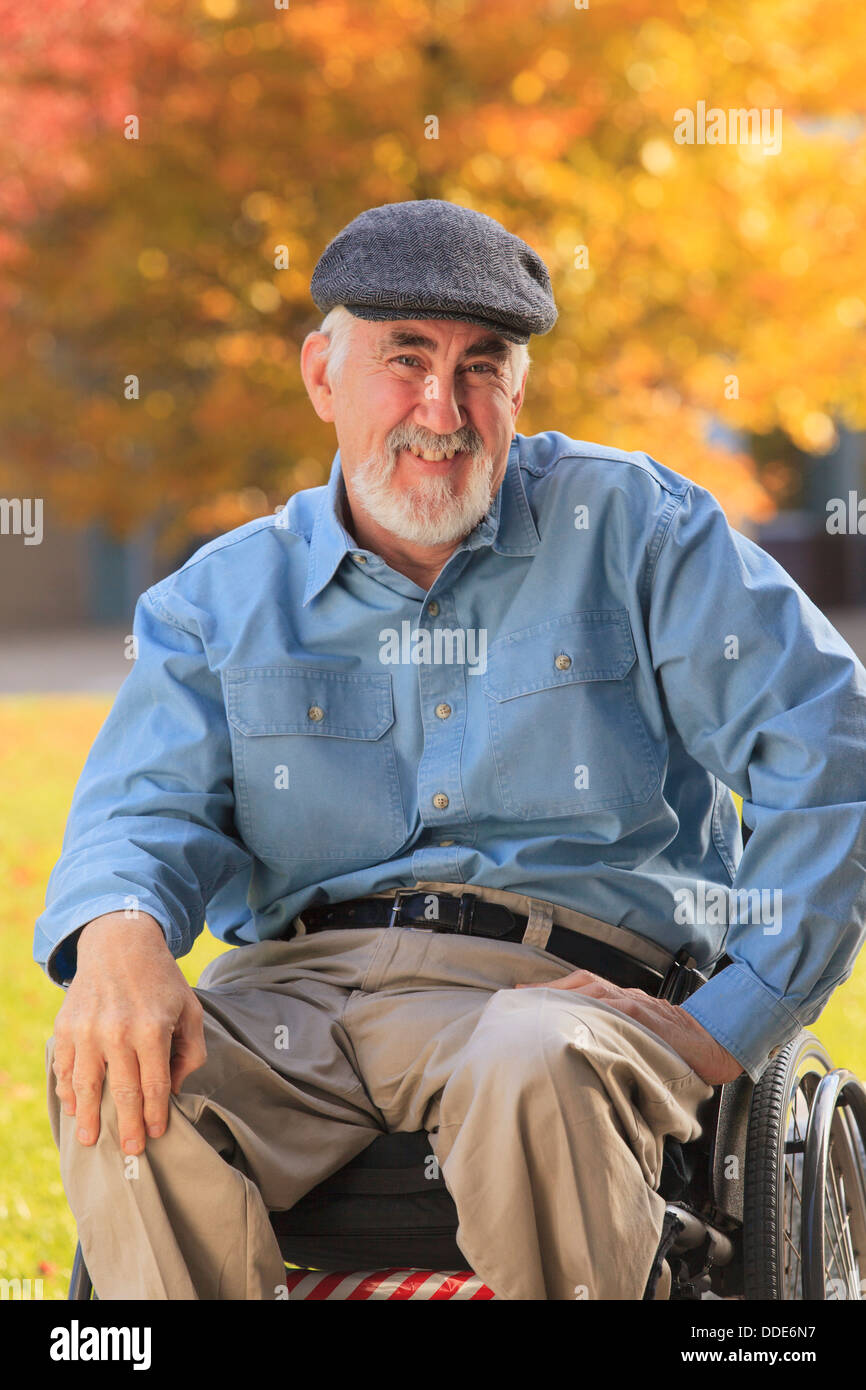 Portrait of a man with Muscular Dystrophy sitting in a wheelchair and