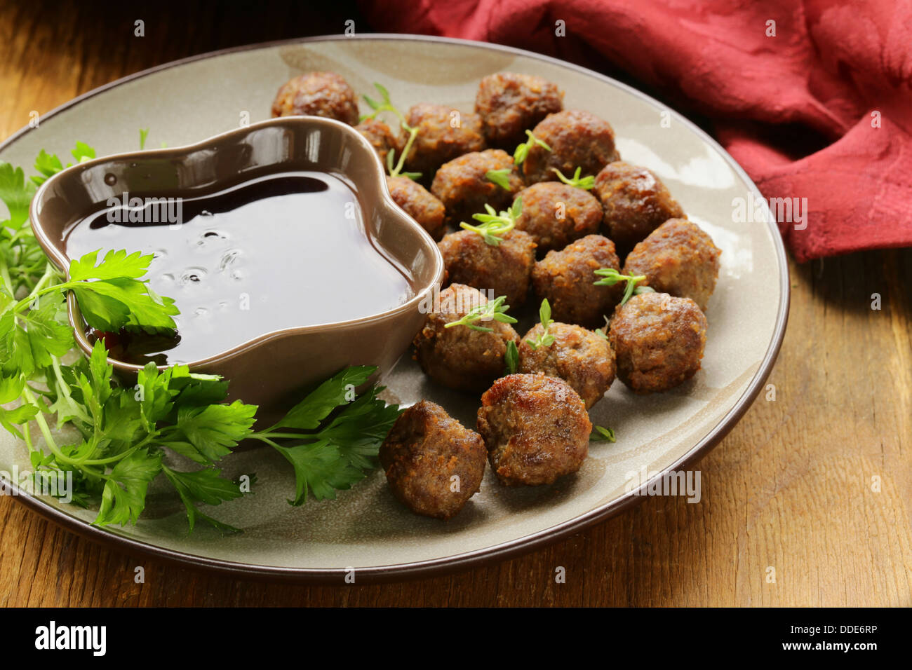 meatballs traditional meat dish with sauce and herbs Stock Photo Alamy