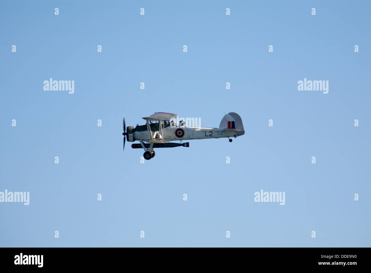 Fairey Swordfish torpedo bomber biplane flies overhead at the