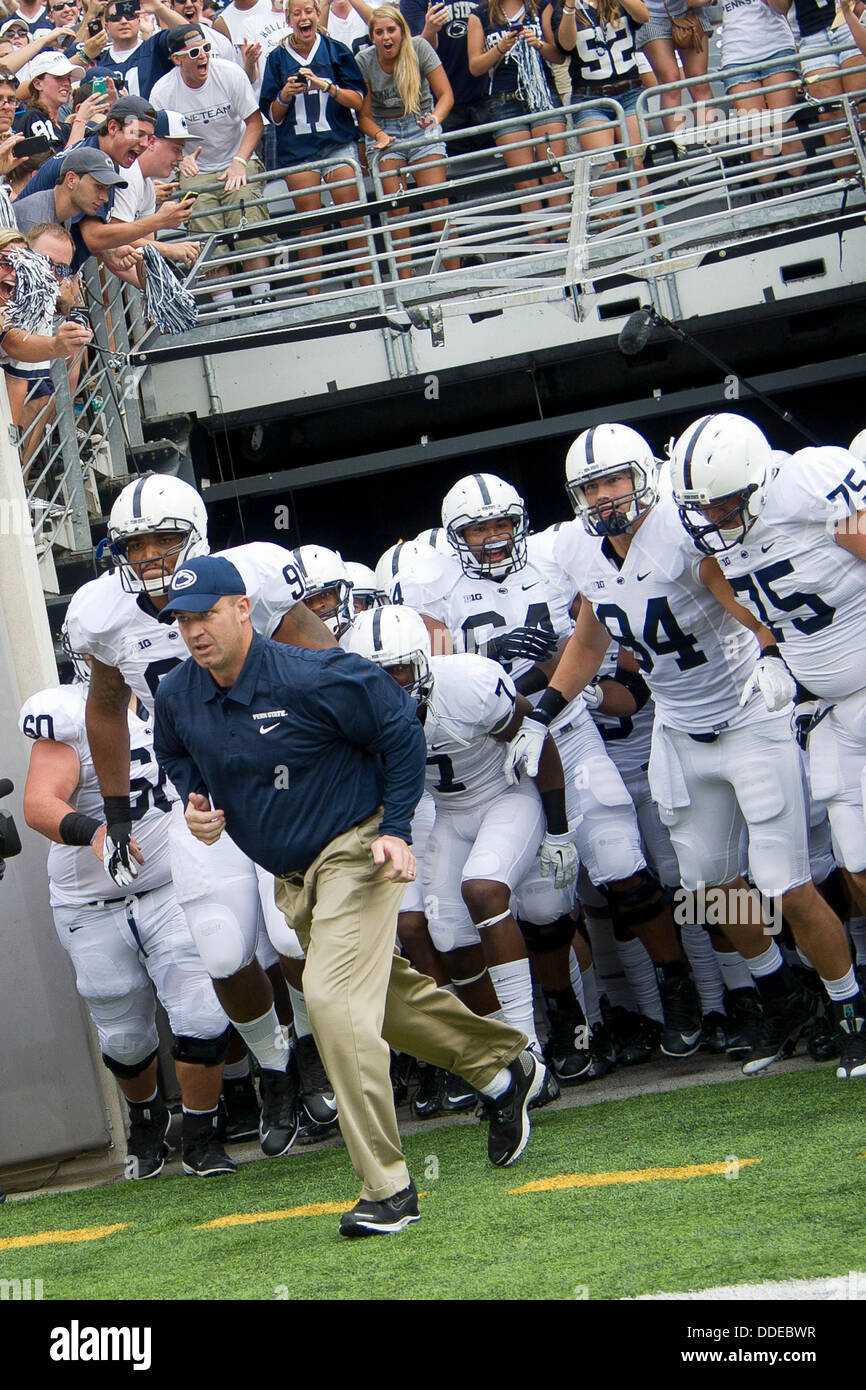 Aug. 31, 2013 - East Rutherford, NJ, U.S - August 31, 2013: Penn State Nittany Lions head coach Bill O' Brien takes the field with his team behind him during the game between Penn State Nittany Lions and Syracuse Orange at Met Life Stadium in East Rutherford, NJ. Penn State Nittany Lions defeat The Syracuse Orange 23-17. Stock Photo