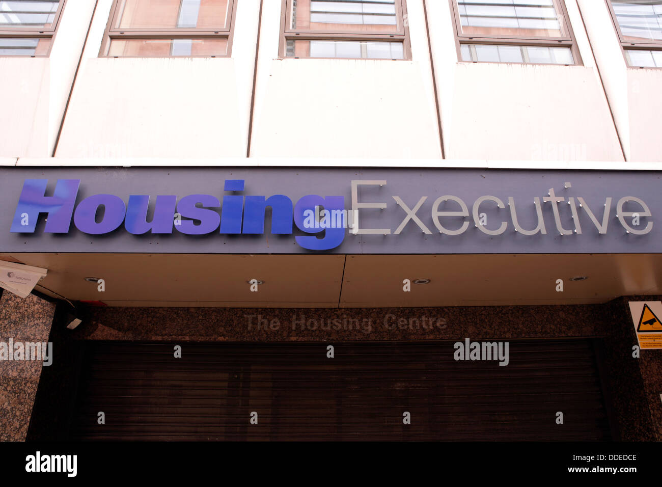 Front view of the Housing Executive Sign in the building in Belfast