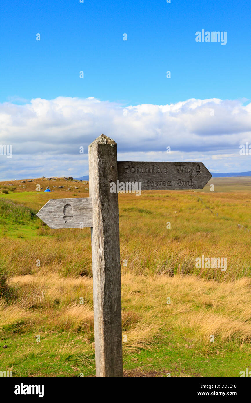 Pennine Way footpath marker post to Bowes in County Durham at Tan Hill, North Yorkshire, Yorkshire Dales National Park, England, UK. Stock Photo