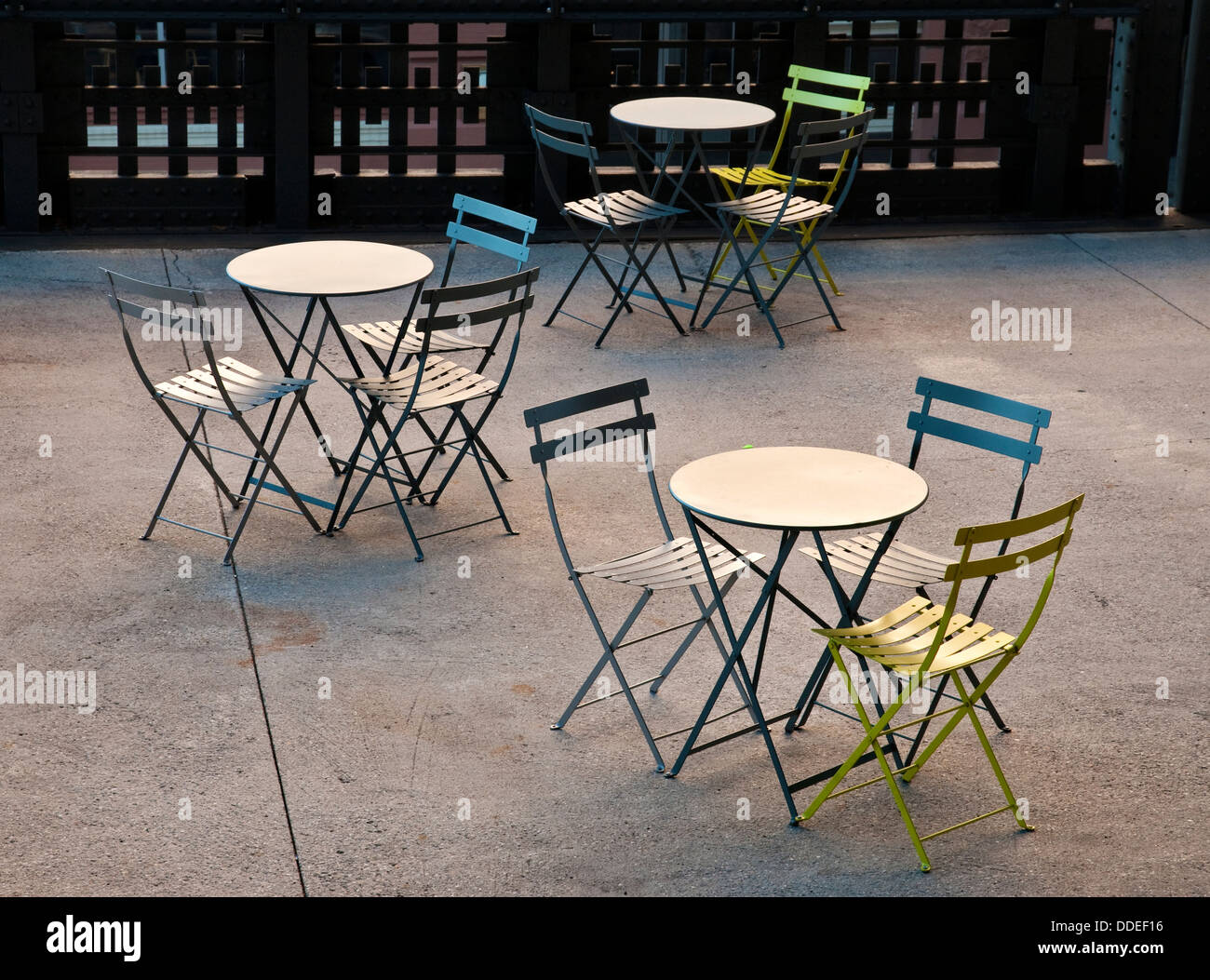 Outdoor tables and chairs on the High Line park in Manhattan, New York City Stock Photo