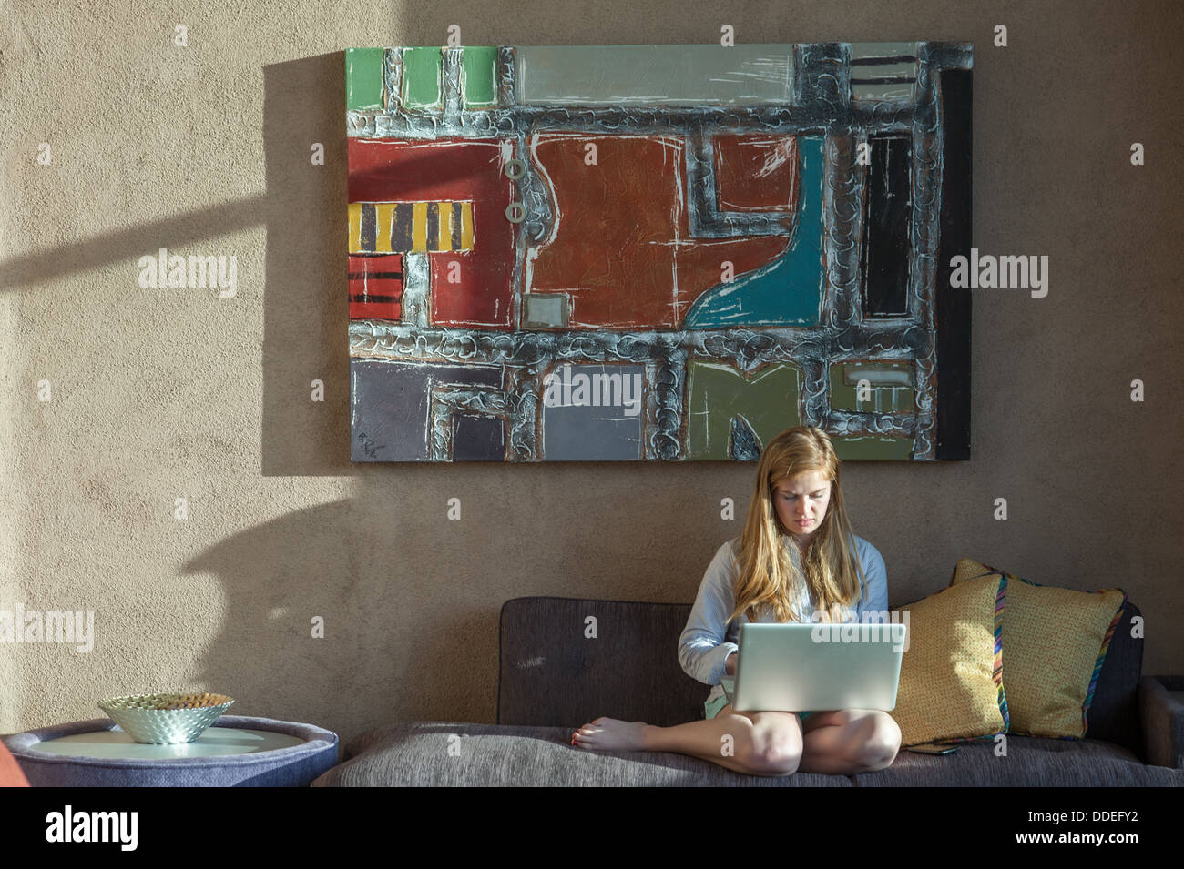 Young Woman Working at Home Stock Photo