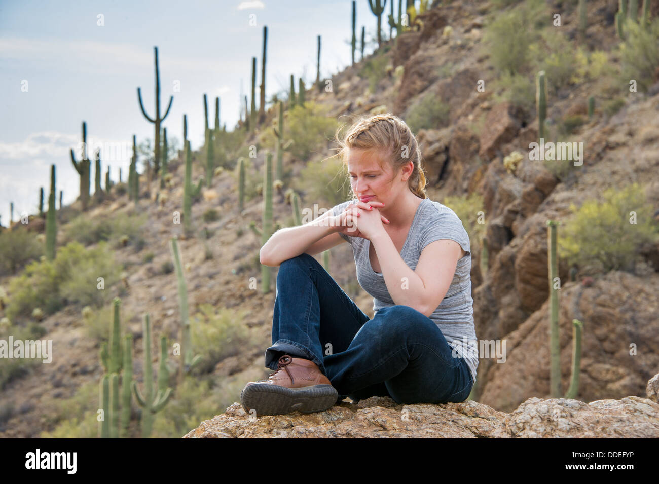 Young Woman Contemplating Grants Pass, Tucson Arizona Stock Photo