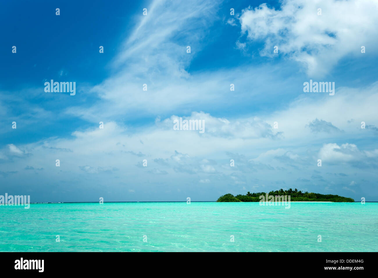 Tropical island in the ocean Stock Photo - Alamy
