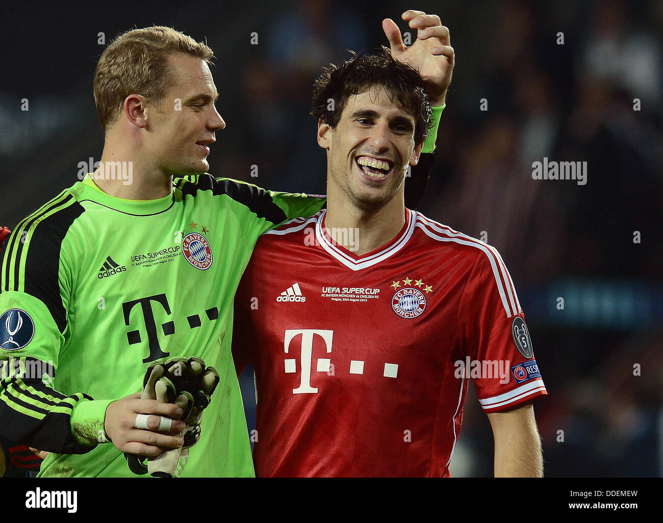 Super Cup soccer match FC Chelsea vs FC Bayern Munich, Prague, Czech Republic, August 30, 2013. Players of FC Bayern Munich Manuel Neuer (left) and Javi Martinez celebrate victory. (CTK Photo/Katerina Sulova) Stock Photo