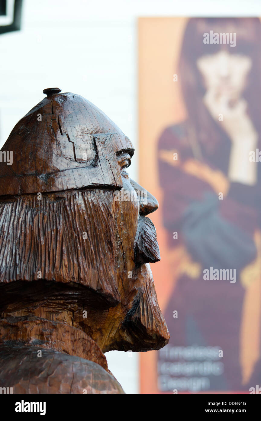 Wooden carved statue of a viking in the street in Reykjavik, Iceland