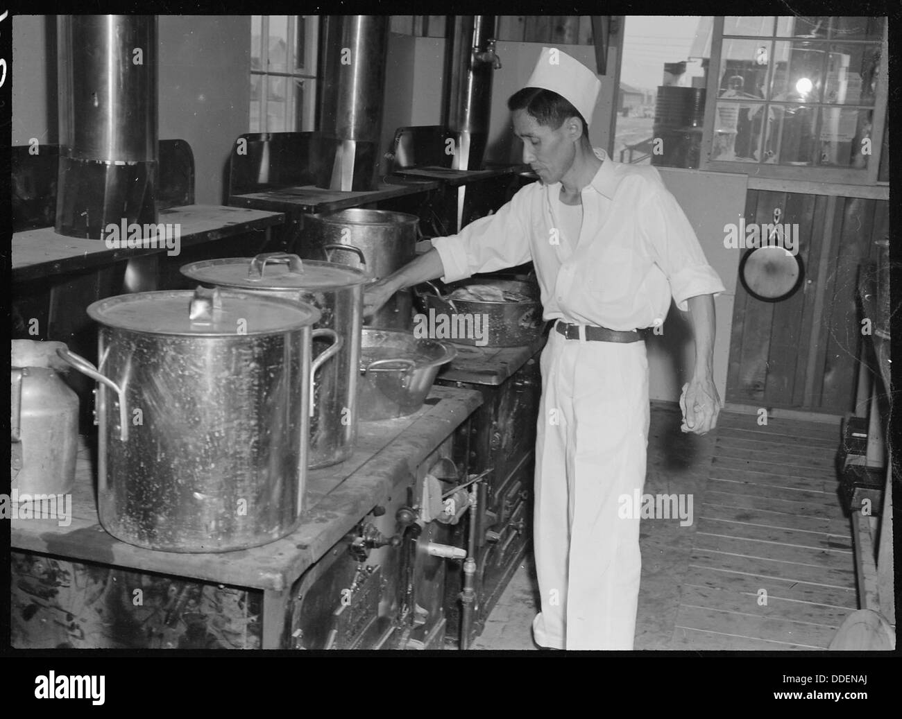 This photo shows cooks and chefs of Japanese ancestry at the Poston ...