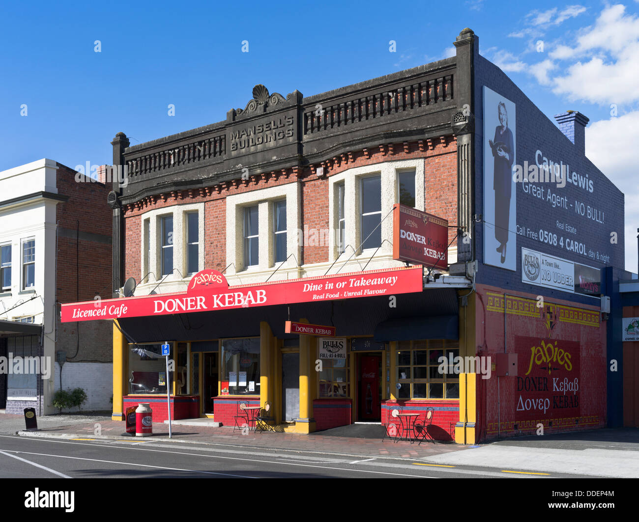 dh  BULLS NEW ZEALAND Takeaway cafe colonial building Bulls adverts Stock Photo