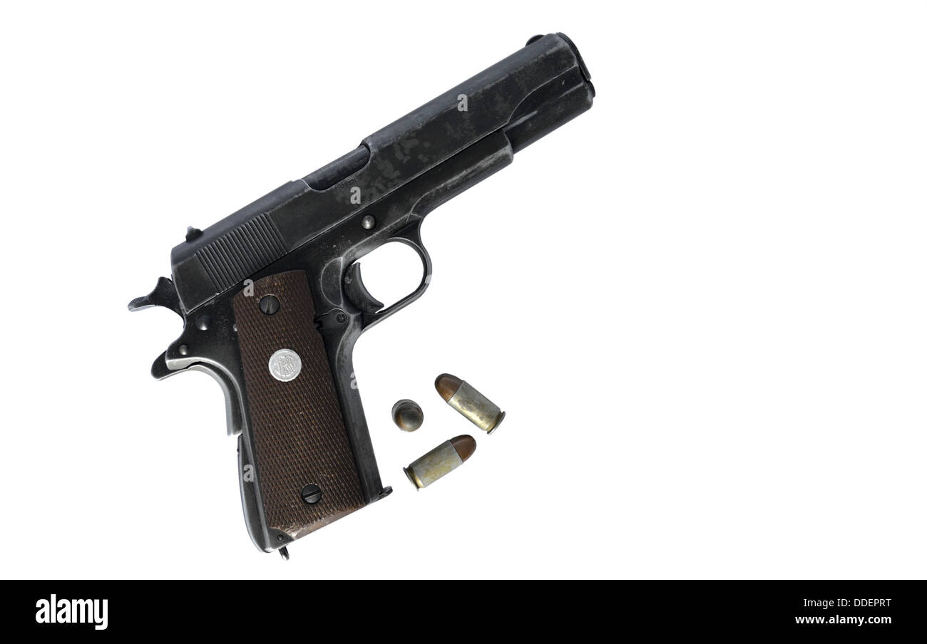 A colt 45  model 1911 with some  bullets Stock Photo