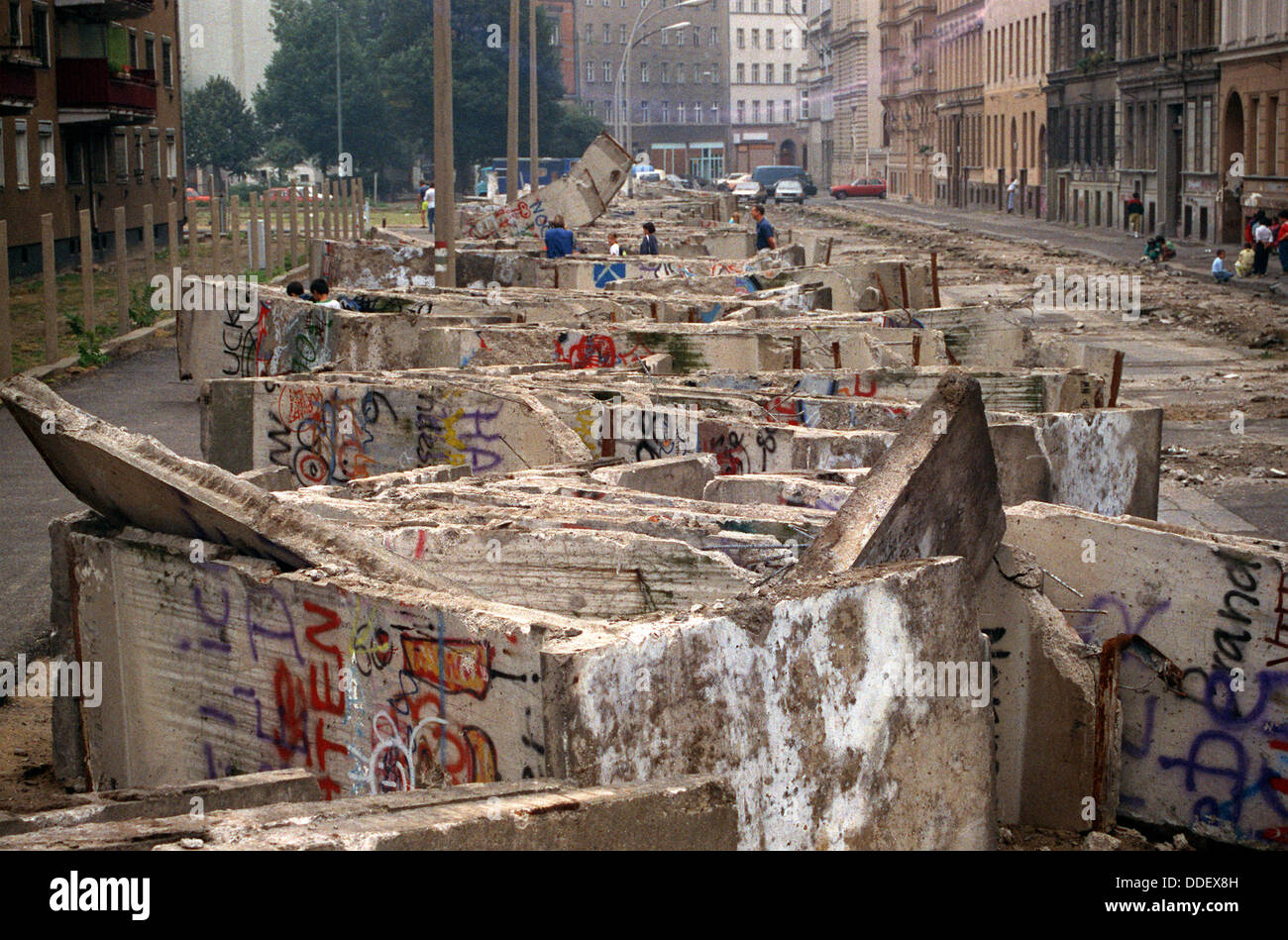 Dismantled pieces of Berlin Wall are piled up to be removed on 11 Stock
