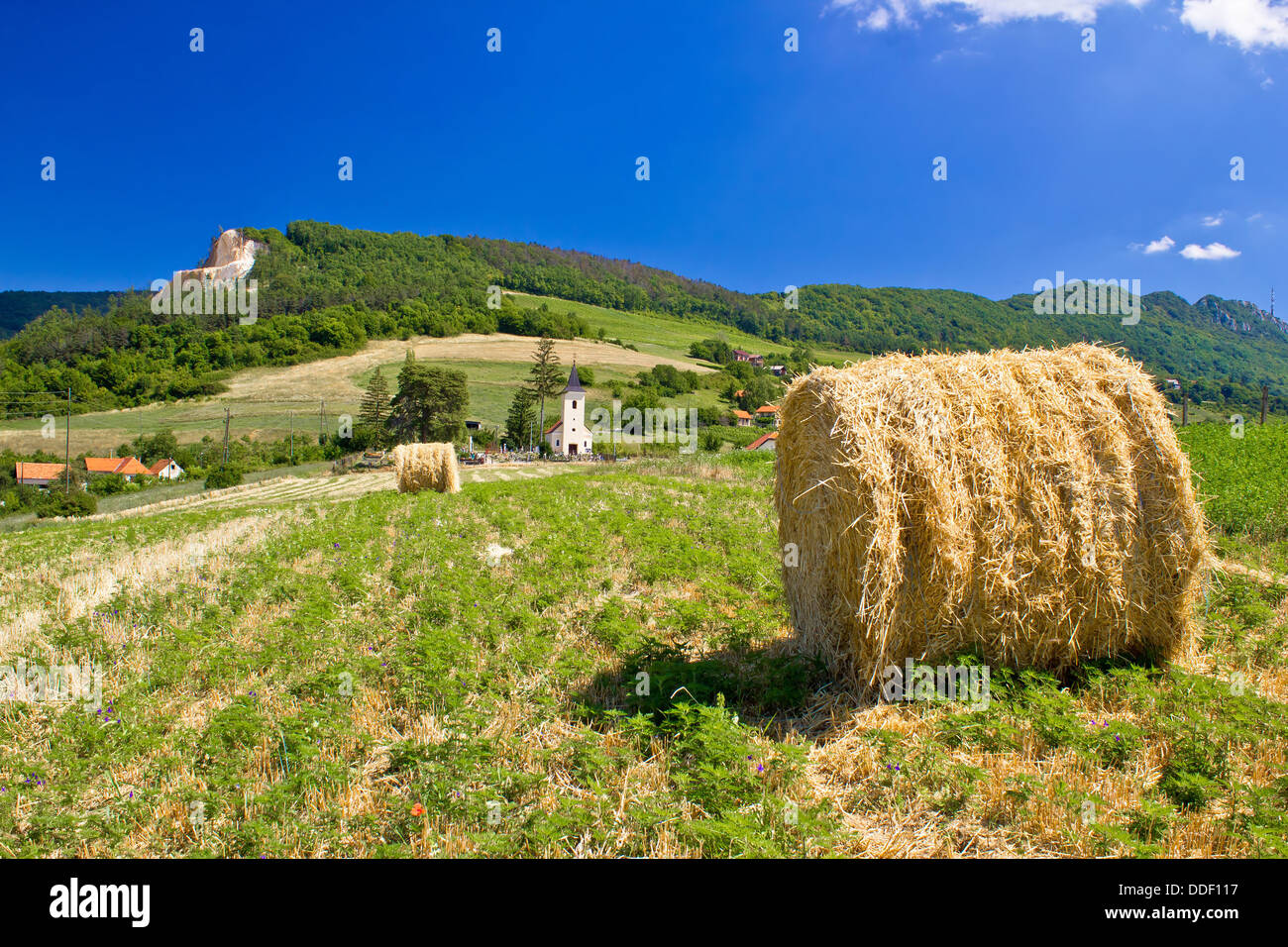 Green landscape, field and church, Kalnik mountain, Croatia Stock Photo