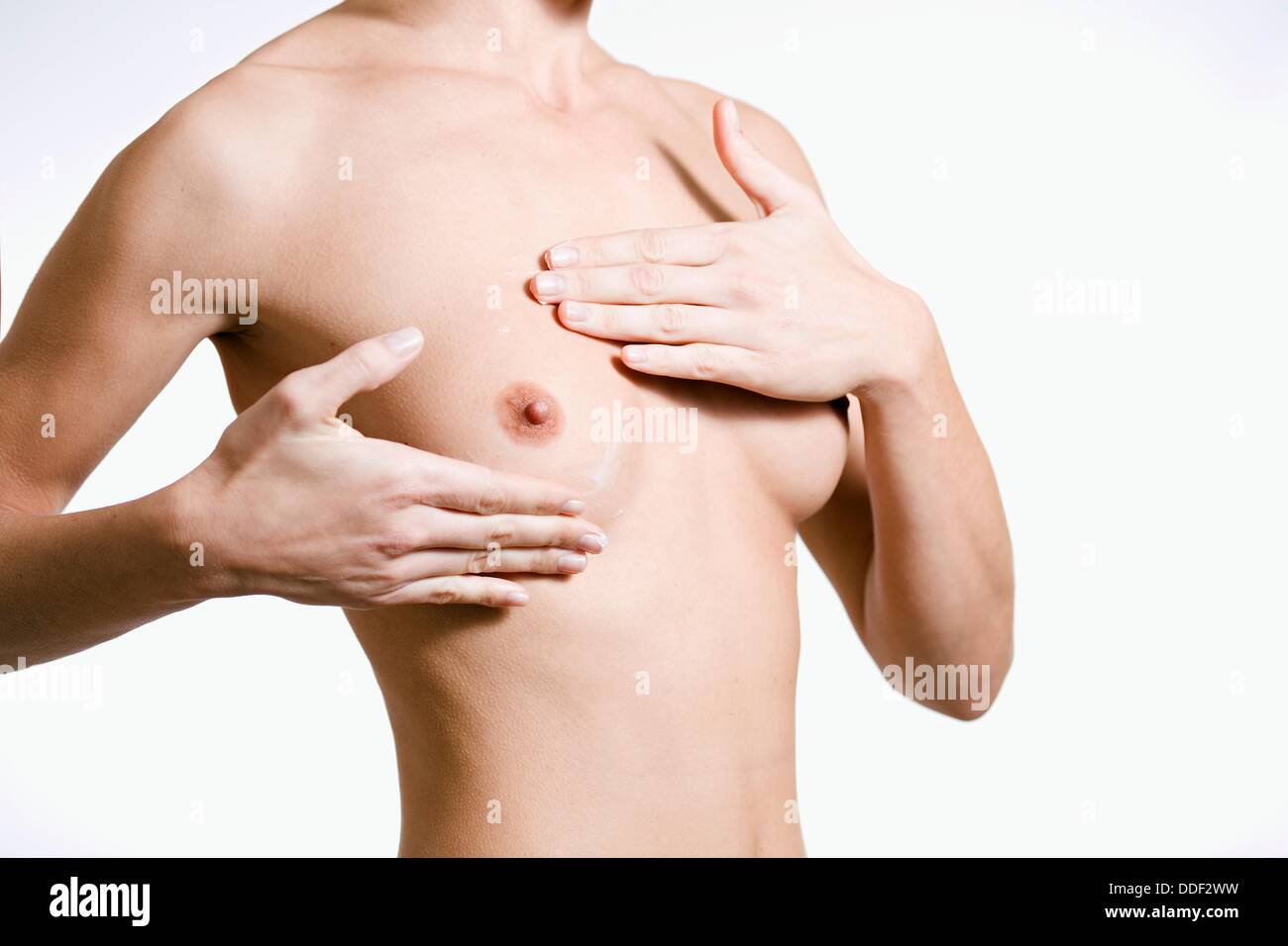 Woman aplying to her Stock Photo - Alamy