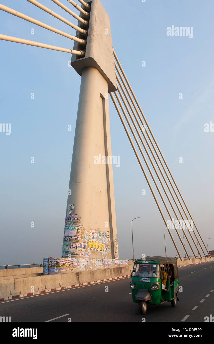 Vehicles cross the Shah Amanat  Bridge which crosses the Karanphuli River in Bangladesh, it is a cable supported structure Stock Photo