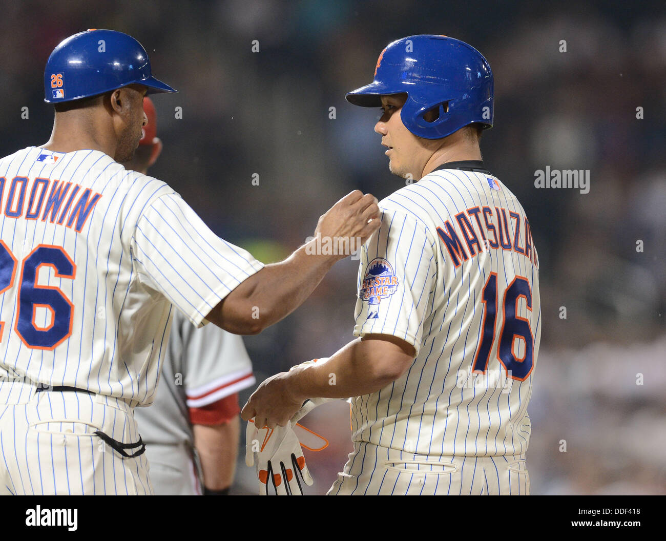 R-L) Daisuke Matsuzaka, Tom Goodwin (Mets), AUGUST 28, 2013 - MLB : Daisuke  Matsuzaka of the New York Mets talks with first base coach Tom Goodwin  after hitting a single in the
