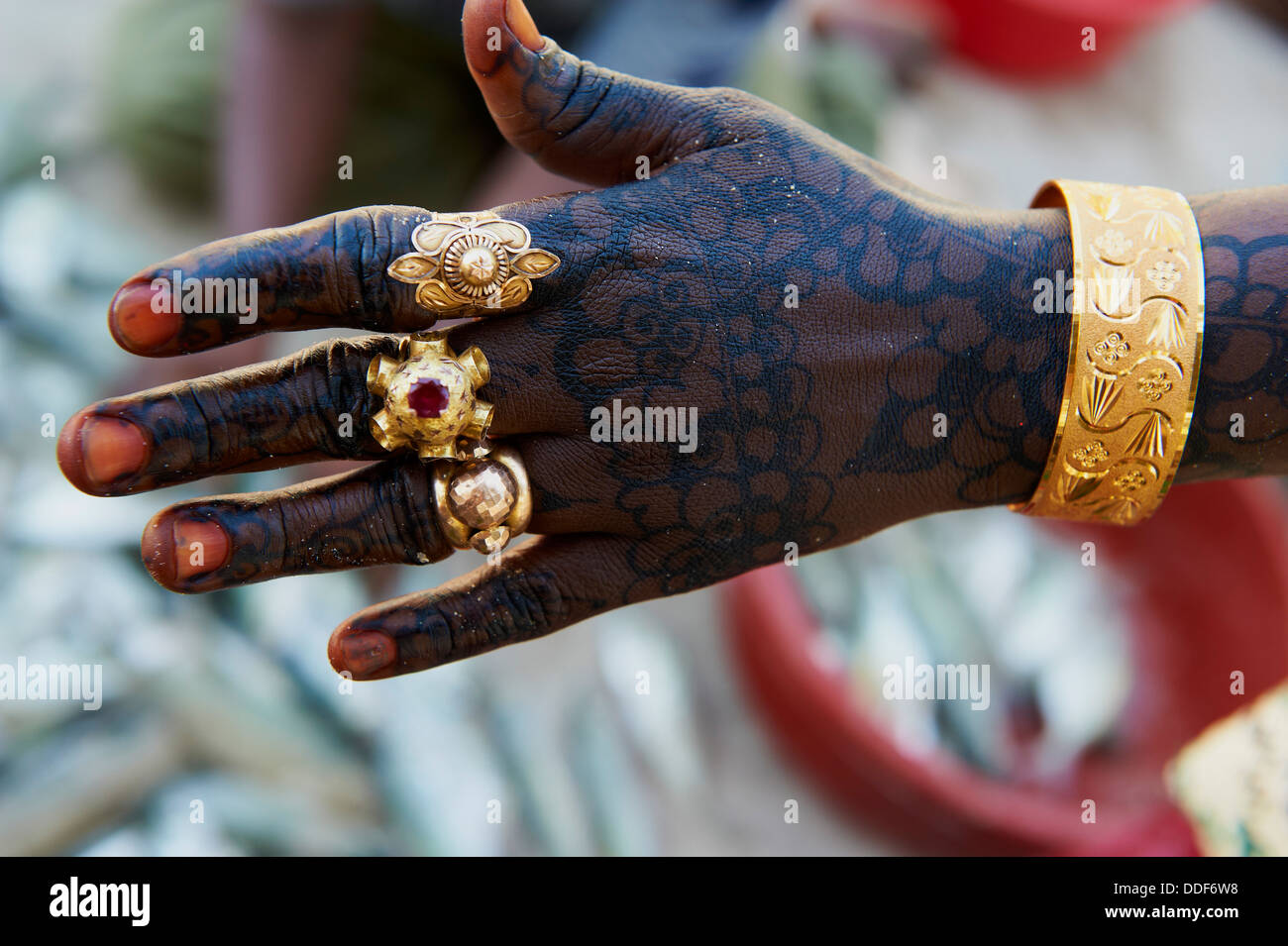 Tanzania, Zanzibar island, Unguja, hand and gold jewels Stock Photo