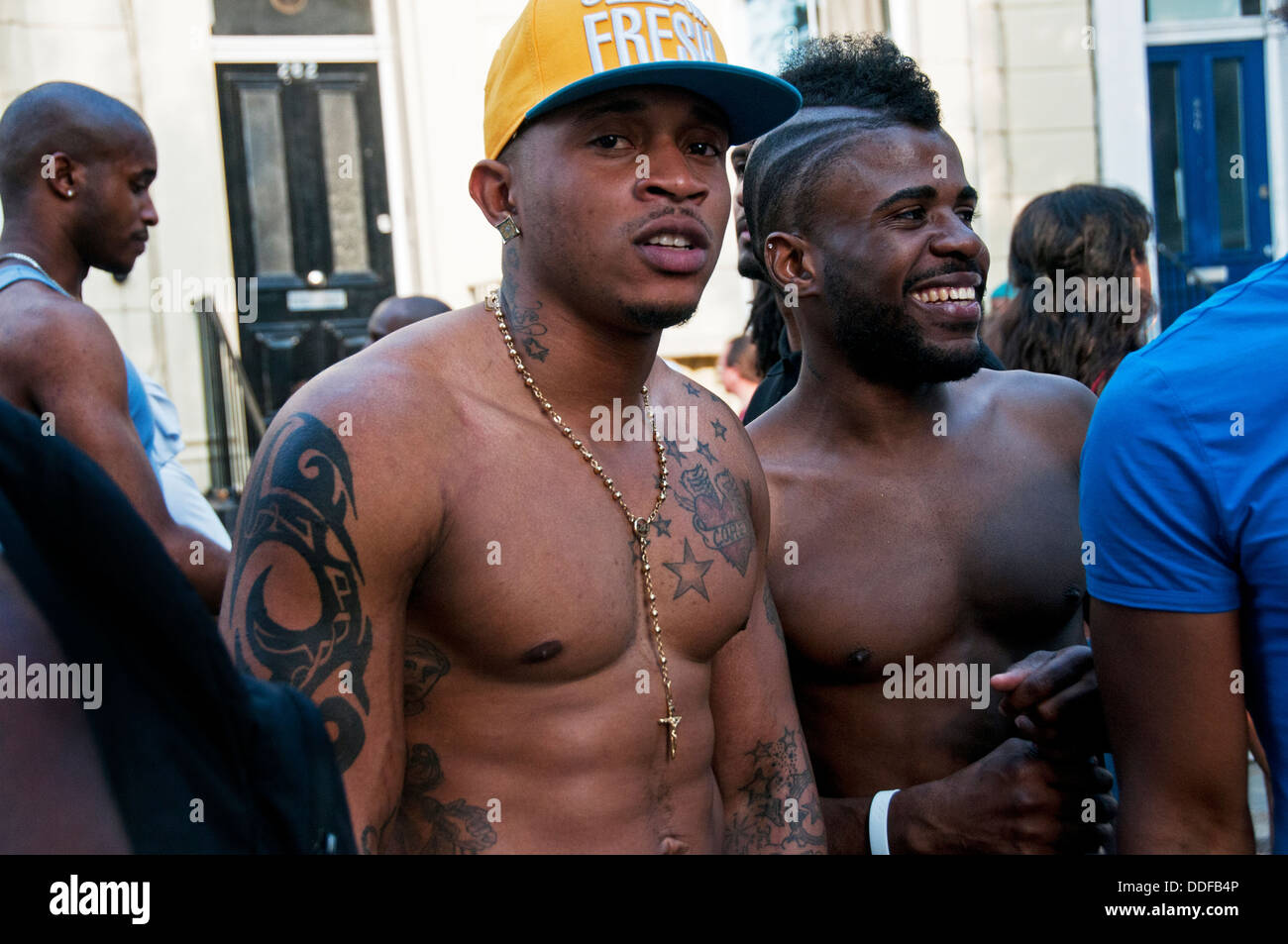 West Indian young men with tattoos partaking in Notting Hill Carnival ...