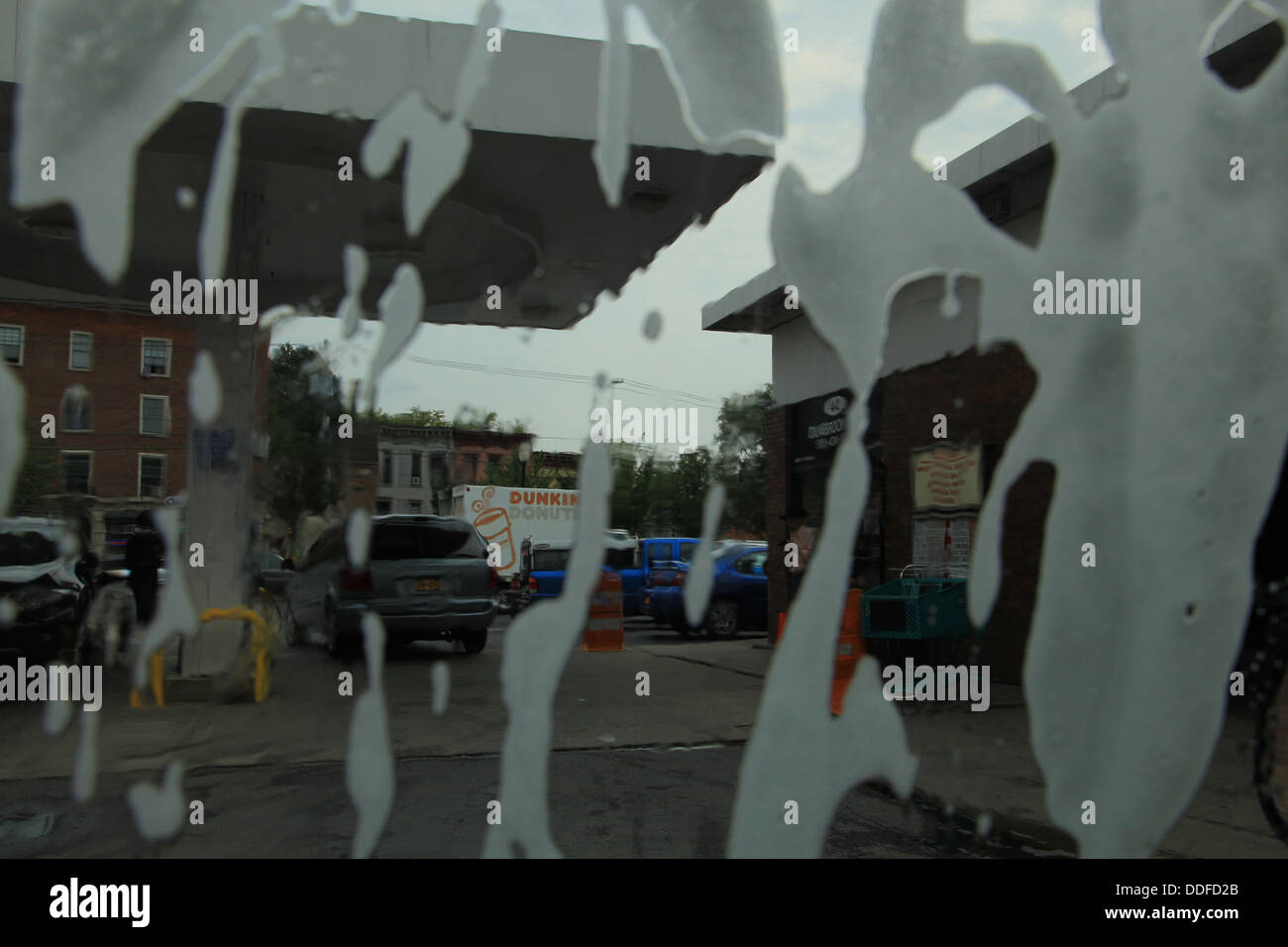 Soap suds on car window in car wash, view from inside Stock Photo Alamy