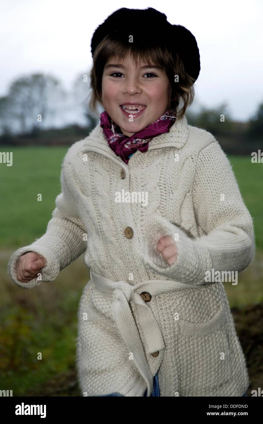 8 year old girl running Stock Photo Alamy