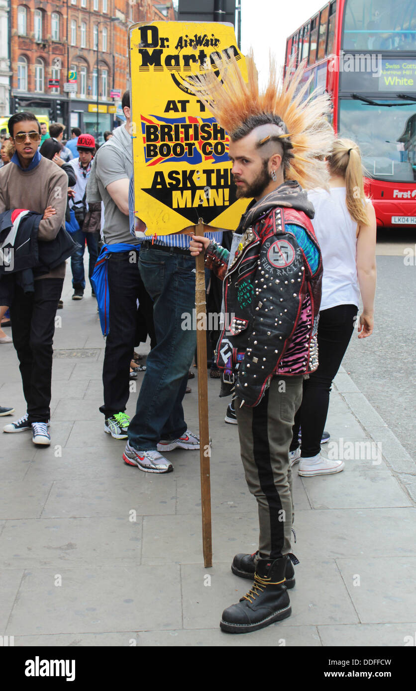 Man advertising Dr Marten boots, London, Britain, UK Stock Photo