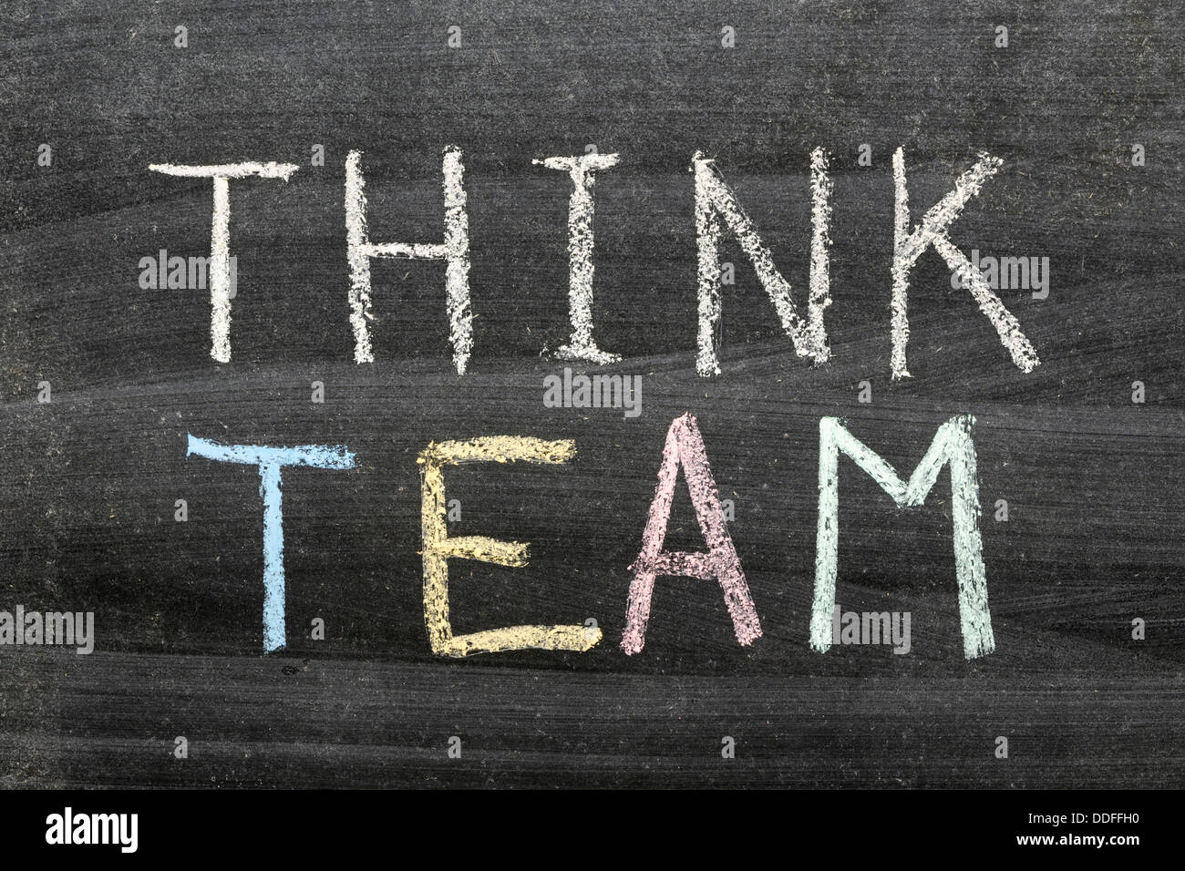 think team concept phrase handwritten on the school blackboard Stock