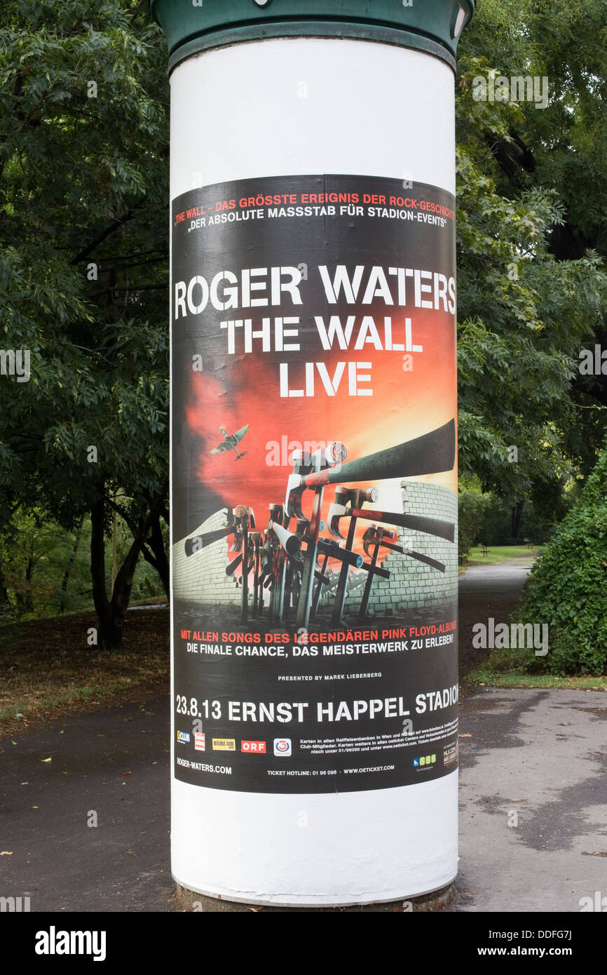 Poster on a stone pillar advertising Roger Waters ' The Wall' Live in Vienna Austria Stock Photo