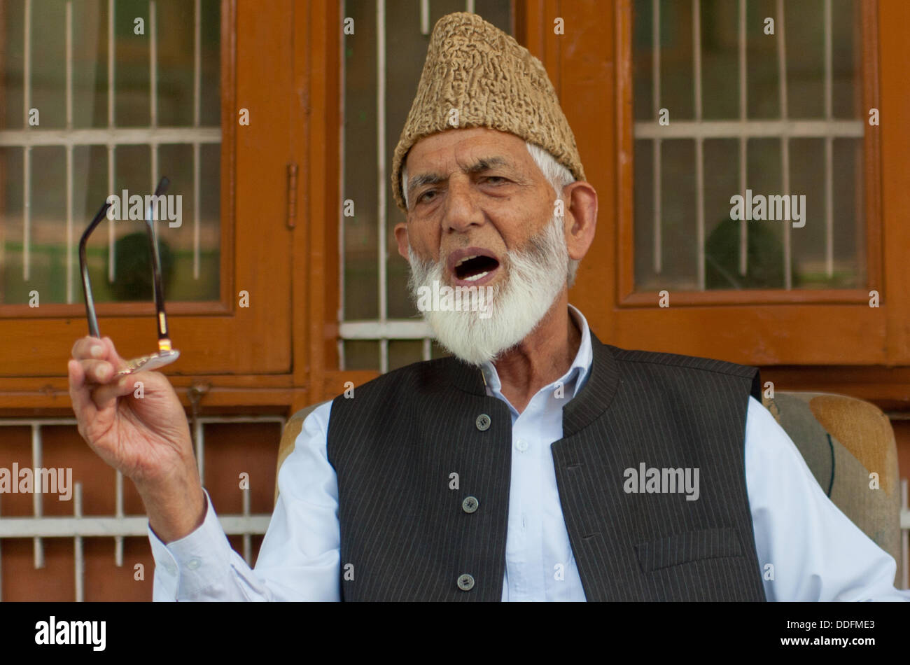 Srinagar, India. 2 September 2013.  Kashmiri separatist leader Syed Ali Geelani addresses a press conference in Srinagar, the summer capital city of Indian-administered Kashmir.  Mr Geelan called for a shutdown on September 7 and peaceful protests on September 6 against  world-renowned orchestra-conductor Zubin Mehta's concert in Srinagar , saying the  event  was meant to divert attention of the international community from 'gross human rights violations being committed by Indian forces against Kashmiris.'  Sofi Suhail/ Alamy Live News) Stock Photo