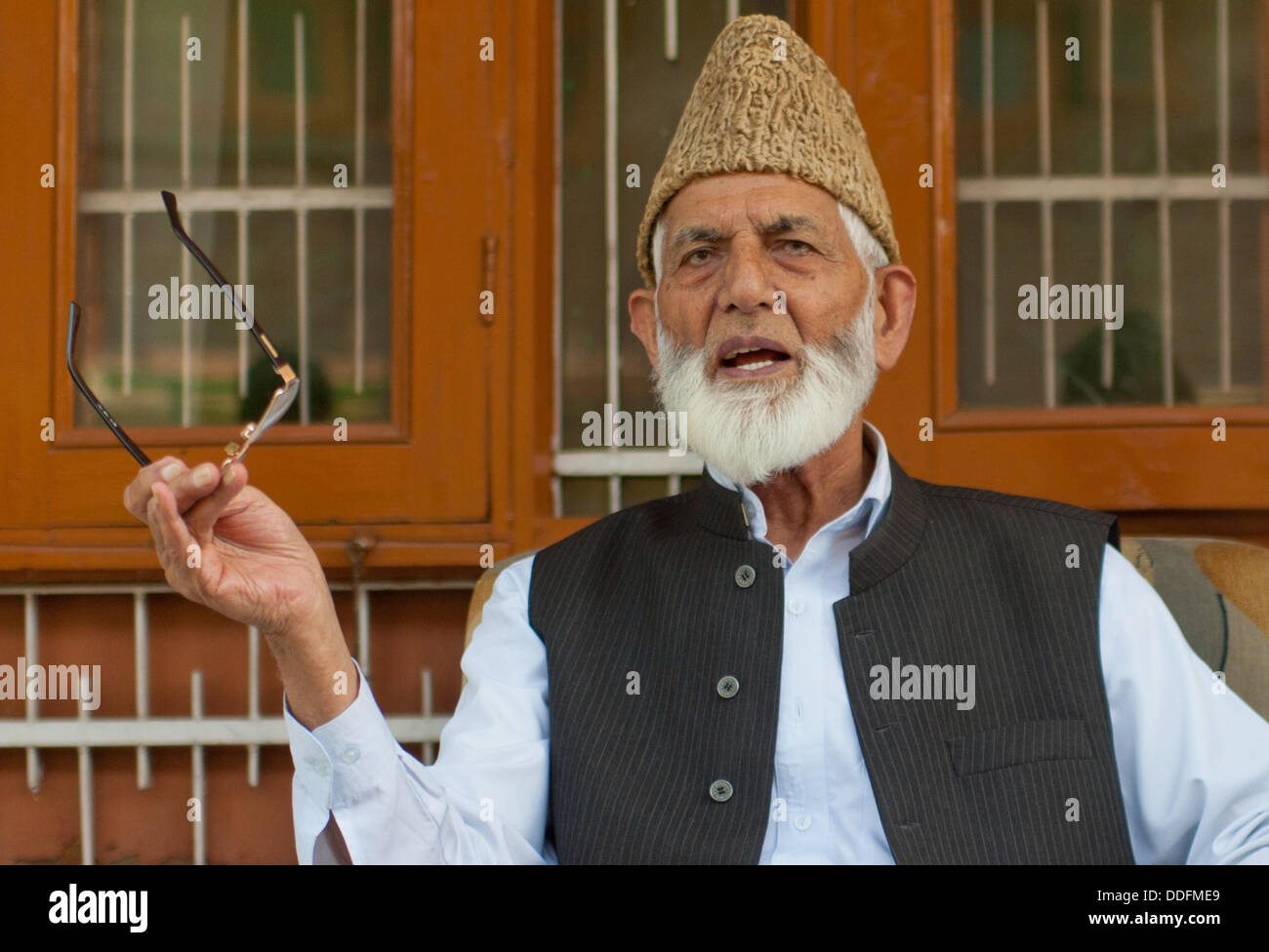 Srinagar, India. 2 September 2013.  Kashmiri separatist leader Syed Ali Geelani addresses a press conference in Srinagar, the summer capital city of Indian-administered Kashmir.  Mr Geelan called for a shutdown on September 7 and peaceful protests on September 6 against  world-renowned orchestra-conductor Zubin Mehta's concert in Srinagar , saying the  event  was meant to divert attention of the international community from 'gross human rights violations being committed by Indian forces against Kashmiris.'  Sofi Suhail/ Alamy Live News) Stock Photo