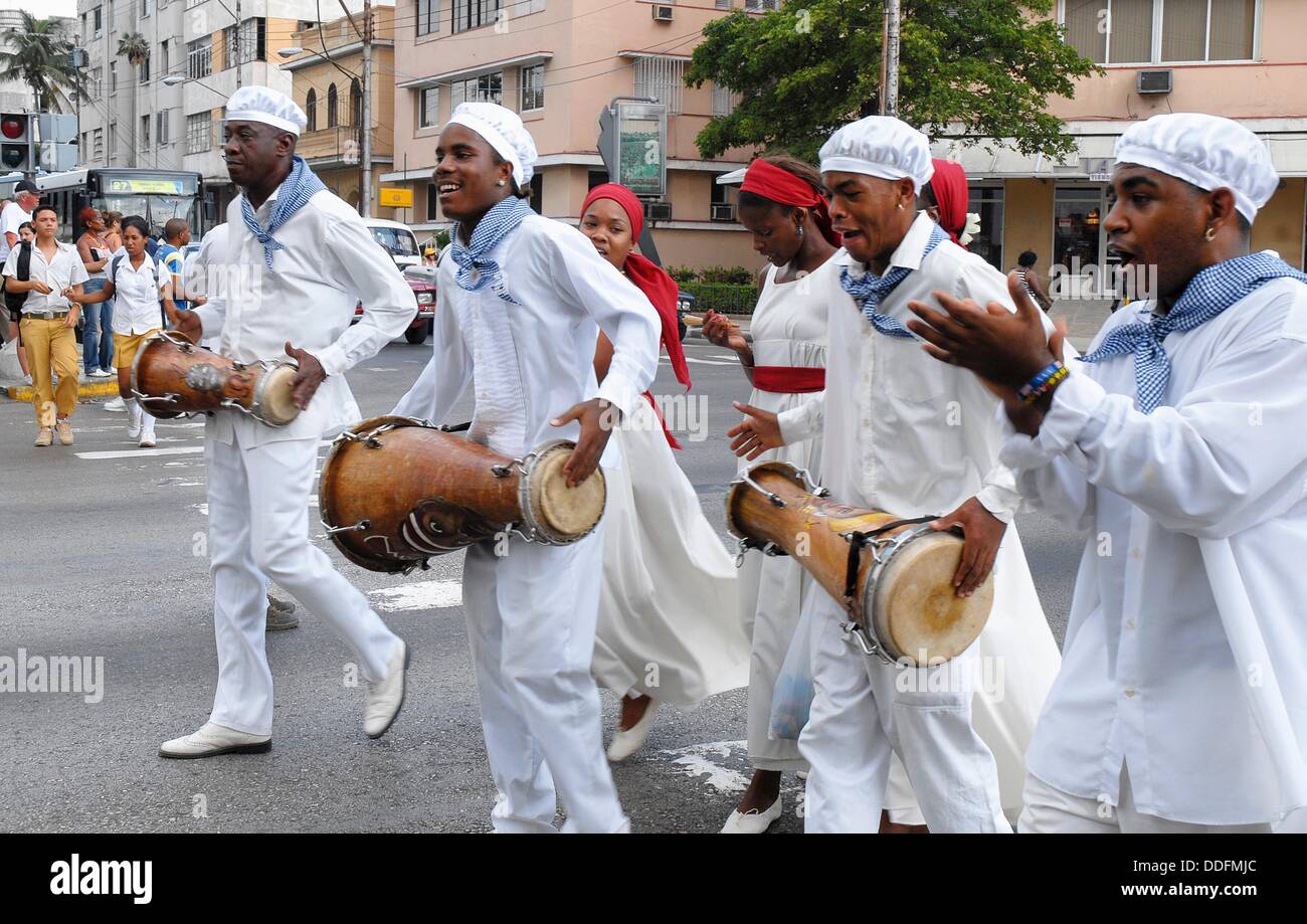 Cuban musicians playing drums during a parade held in Havana Cuba Stock