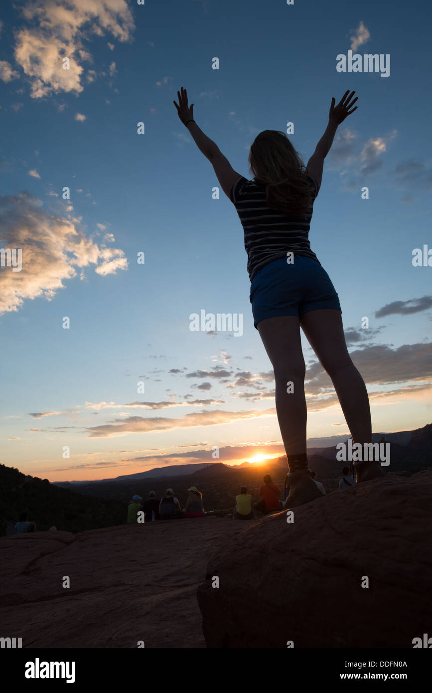 Young Woman with Hands Up Airport Vortex Sedona Arizona Stock Photo