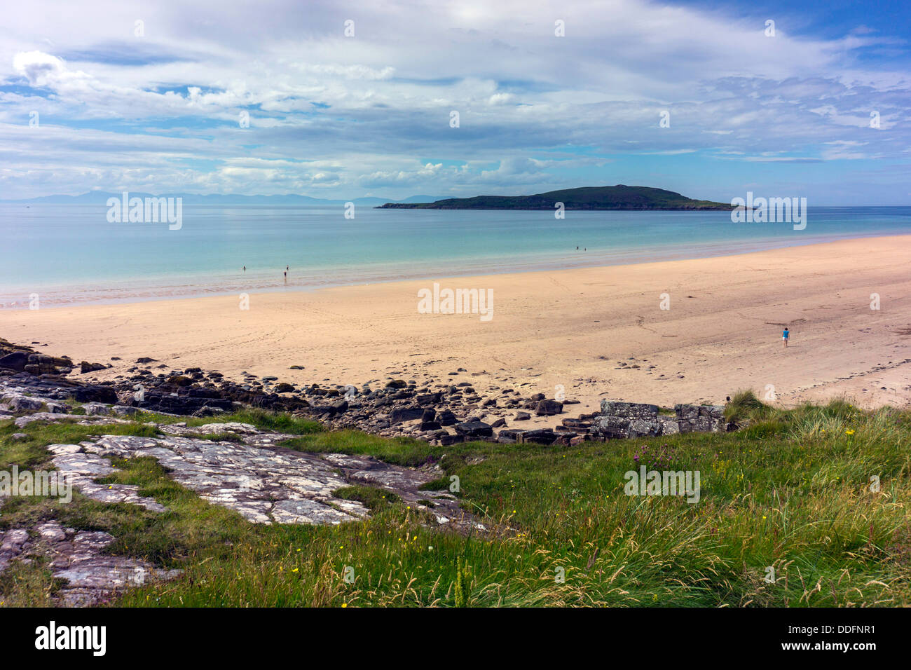 Small people in distance on wide sandy beach, sea and sky, Gairloch, Northwest Scotland, summer, holidays, Stock Photo