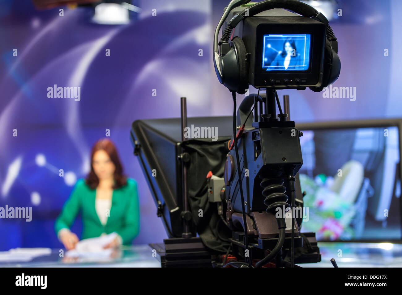 Video camera viewfinder recording show in TV studio focus on camera