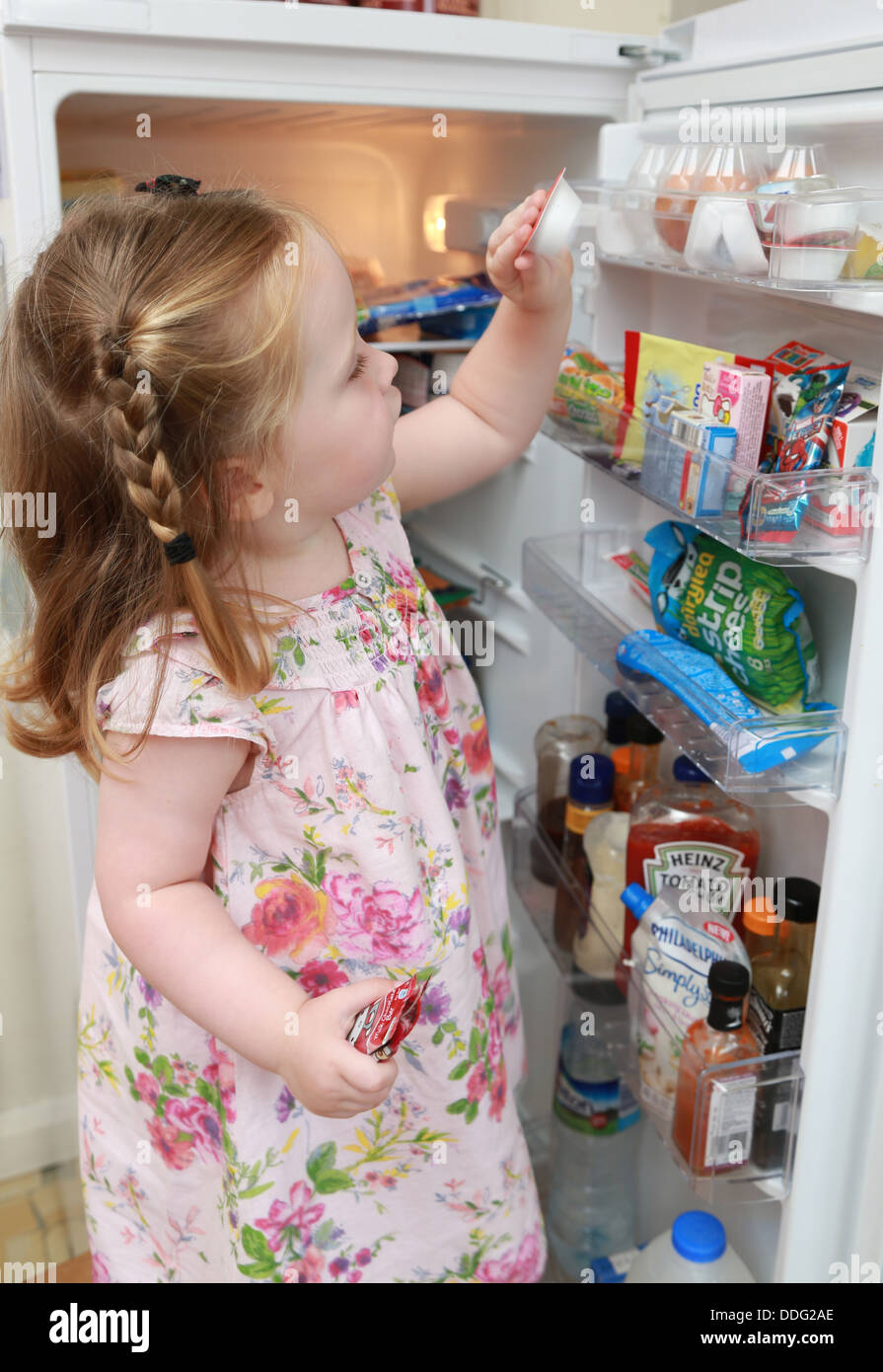 Kid Looking At Fridge High Resolution Stock Photography and Images Alamy